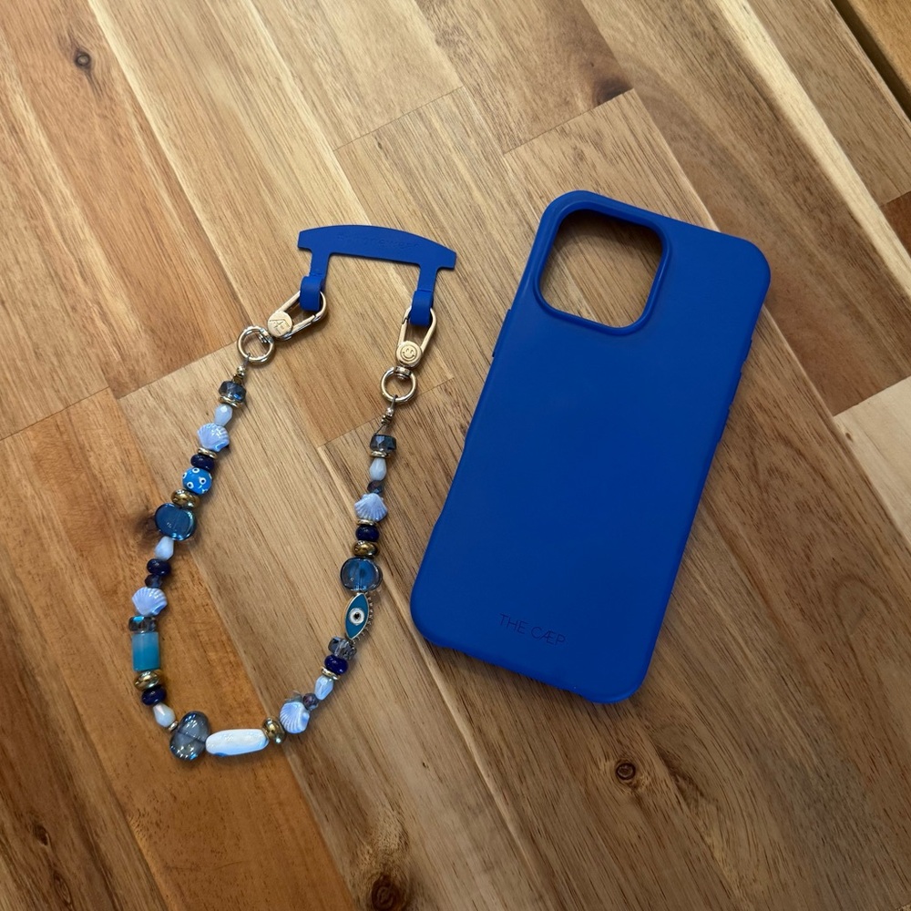 The Caep iPhone 16 Pro Max Blue Phone Case with Beaded Strap